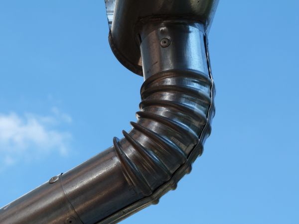 Metal Downspout Installation in Carrollton